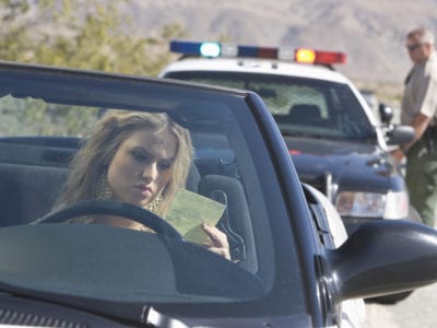 photo of a person being pulled over by the police. time for a Traffic Ticket Lawyer