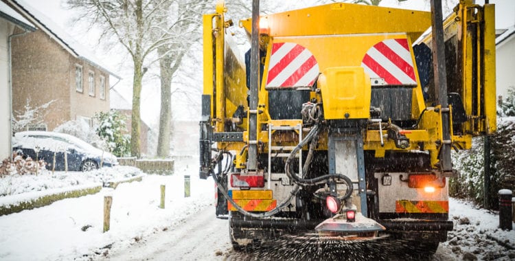 Photo of a salt truck in winter, the kind our client hit and got a reckless driving ticket in va